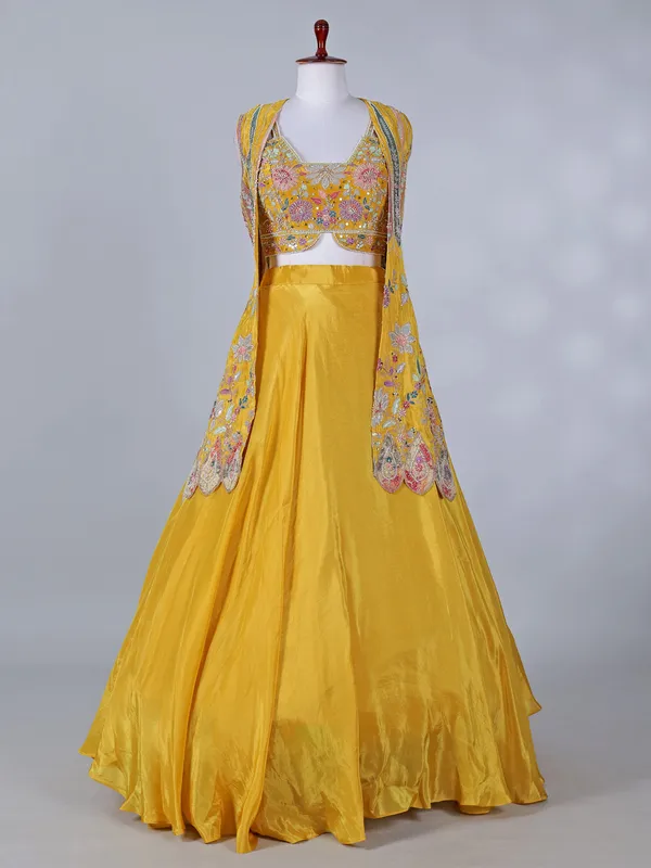Yellow silk jacket style lehenga choli for haldi
