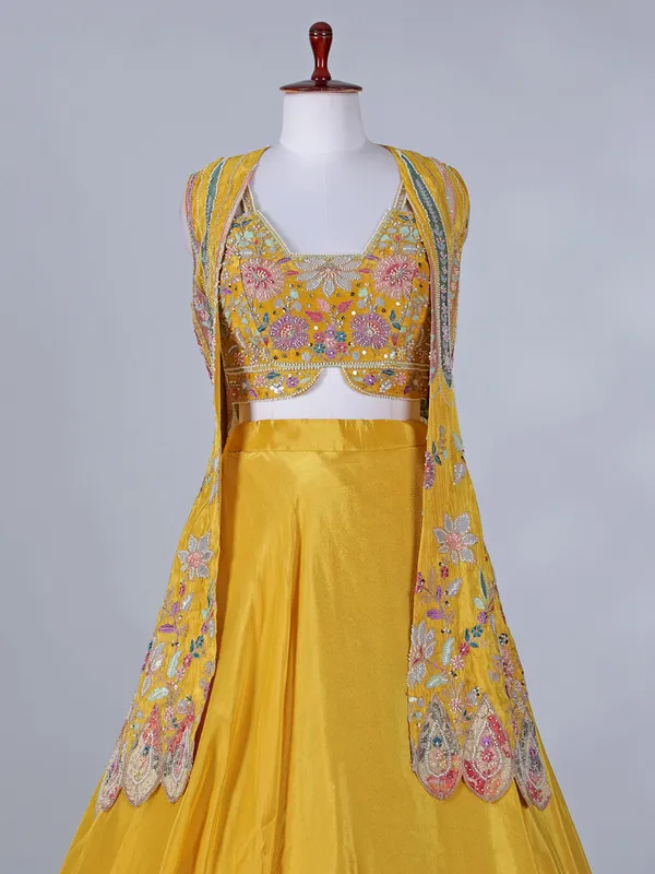 Yellow silk jacket style lehenga choli for haldi