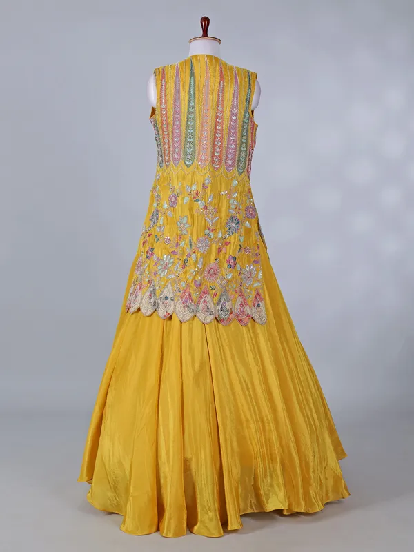 Yellow silk jacket style lehenga choli for haldi