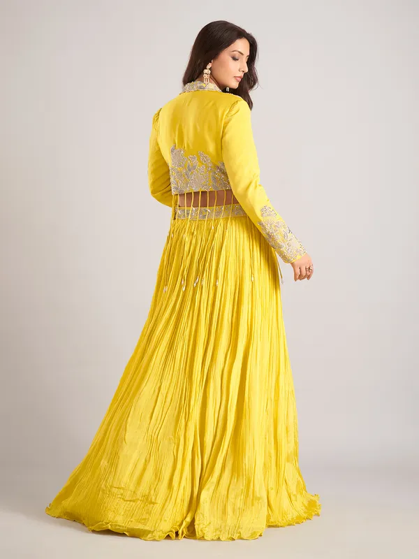 Yellow silk jacket style lehenga choli with cutdana work