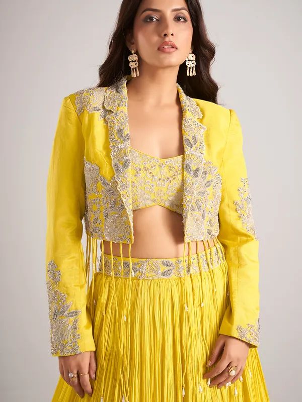 Yellow silk jacket style lehenga choli with cutdana work