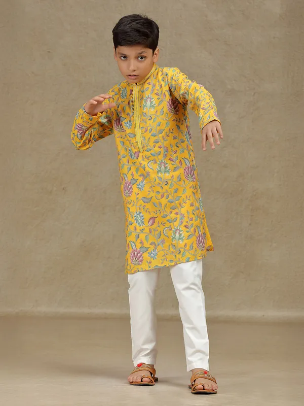 Yellow silk kurta suit for haldi with print