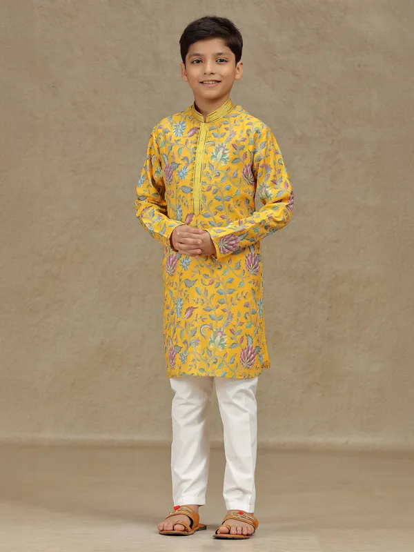 Yellow silk kurta suit for haldi with print