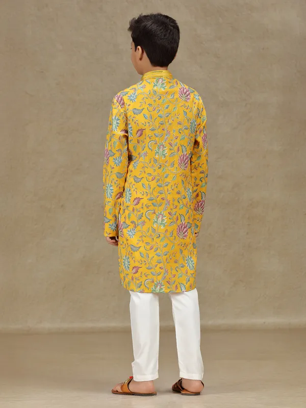Yellow silk kurta suit for haldi with print