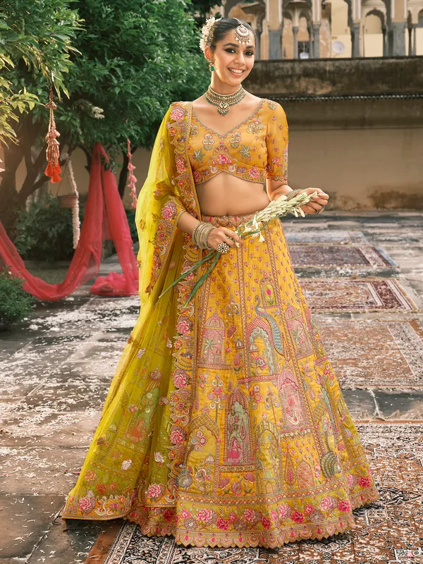 Yellow silk lehenga choli for haldi celebration