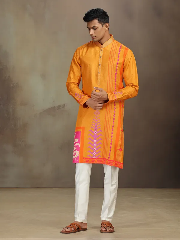 Yellow silk printed kurta suit with resham and sequins work