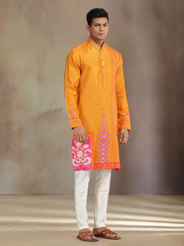 Yellow silk printed kurta suit with resham and sequins work
