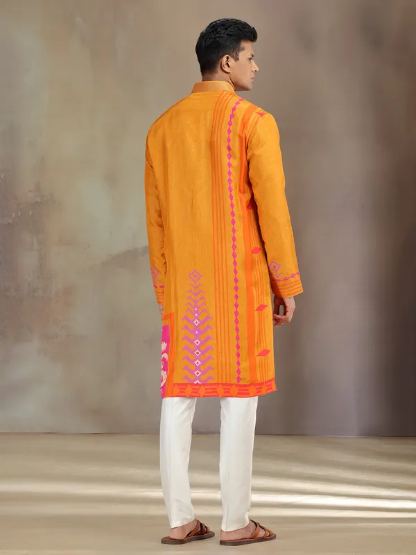 Yellow silk printed kurta suit with resham and sequins work