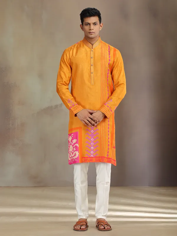 Yellow silk printed kurta suit with resham and sequins work