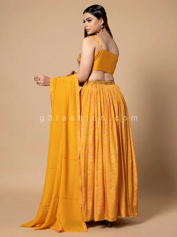 Yellow silk printed lehenga choli with dupatta