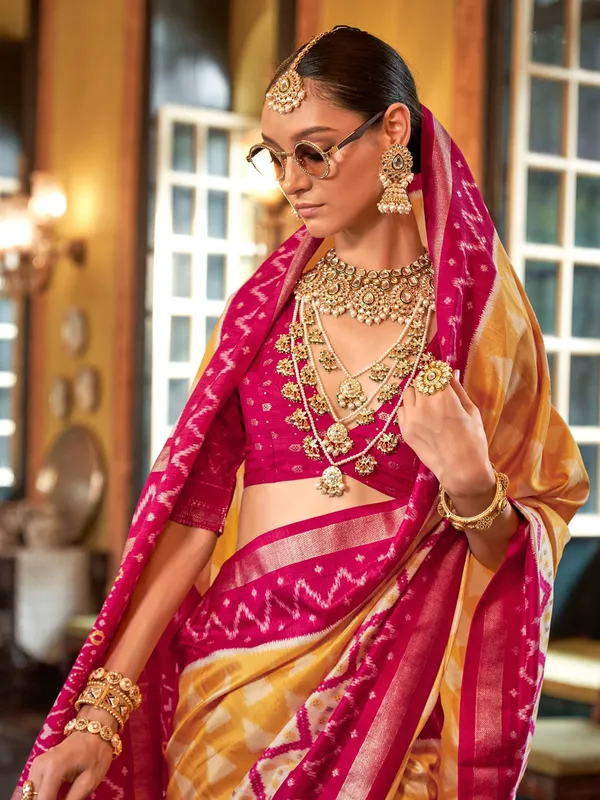 Yellow silk printed saree with zari work