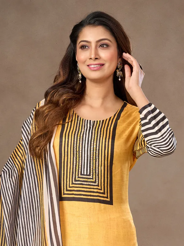 Yellow silk salwar suit with aabla and resham work