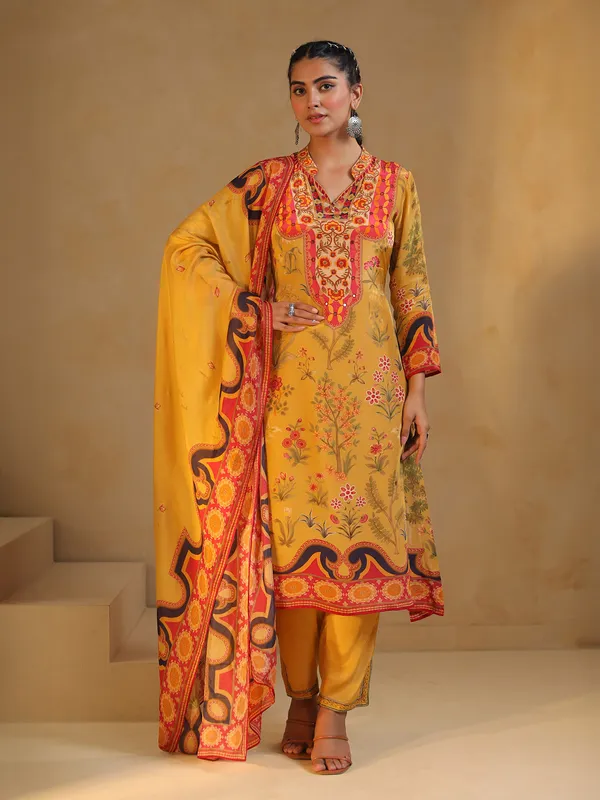Yellow silk salwar suit with atrractive print
