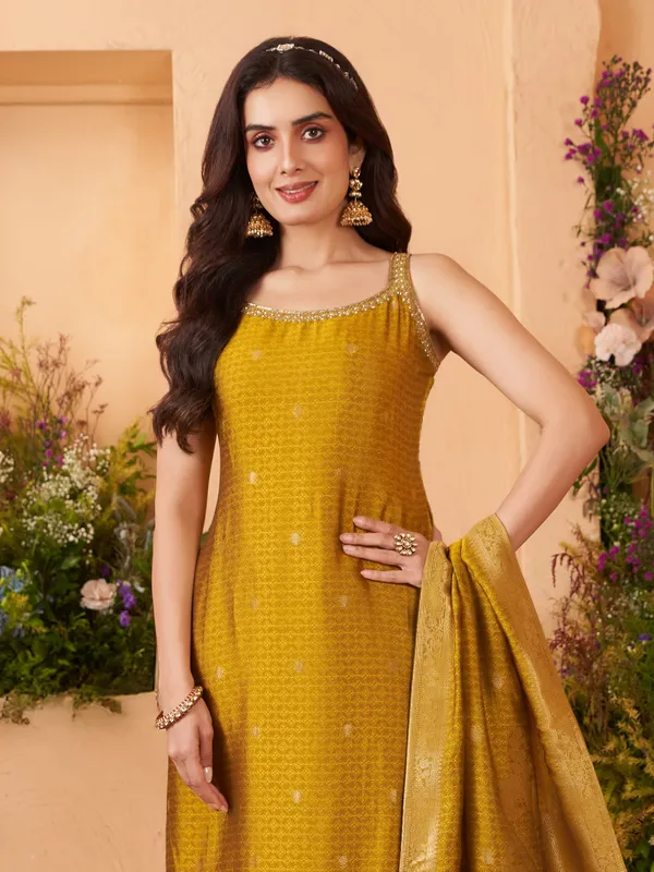 Yellow silk salwar suit with majestic zardosi wedding radiance