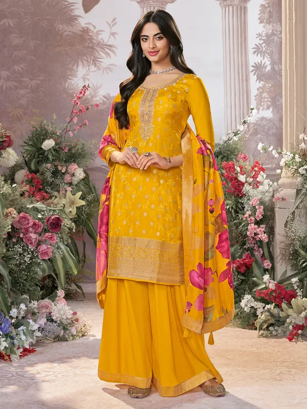 Yellow silk salwar suit with printed dupatta for festive wear