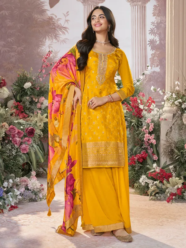 Yellow silk salwar suit with printed dupatta for festive wear