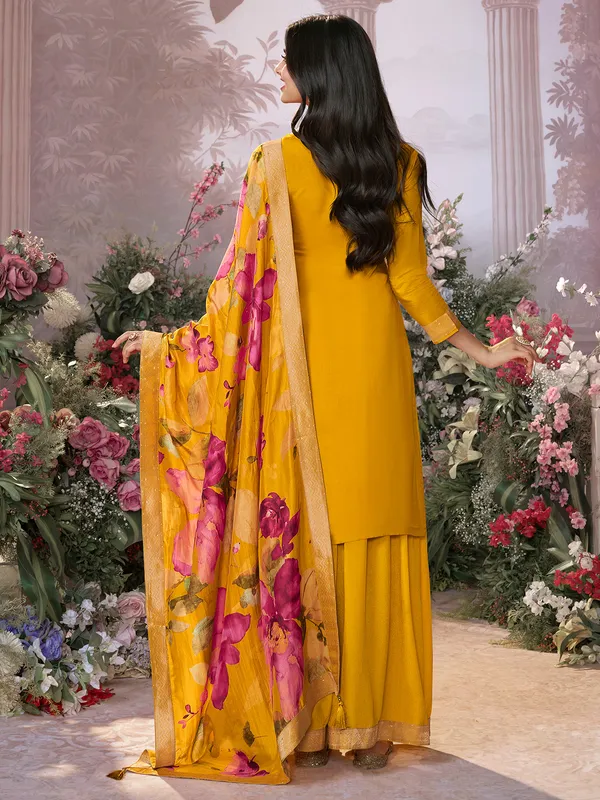 Yellow silk salwar suit with printed dupatta for festive wear