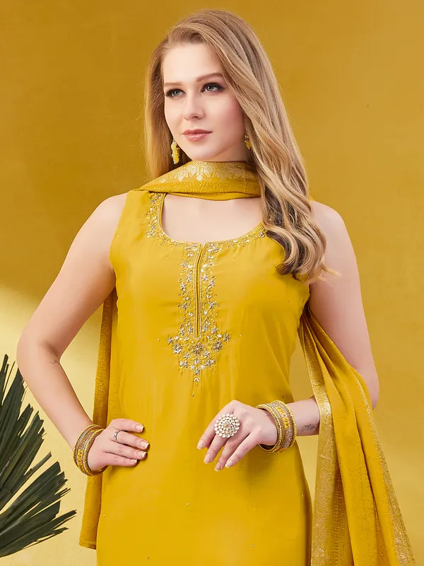 Yellow silk salwar suit with zari embellished dupatta