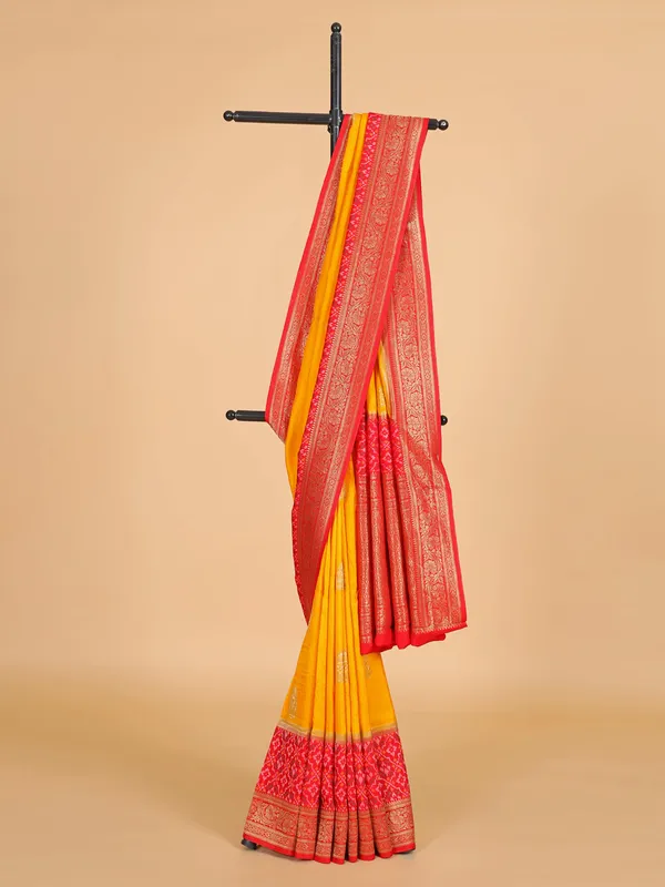 Yellow silk saree with bold red border