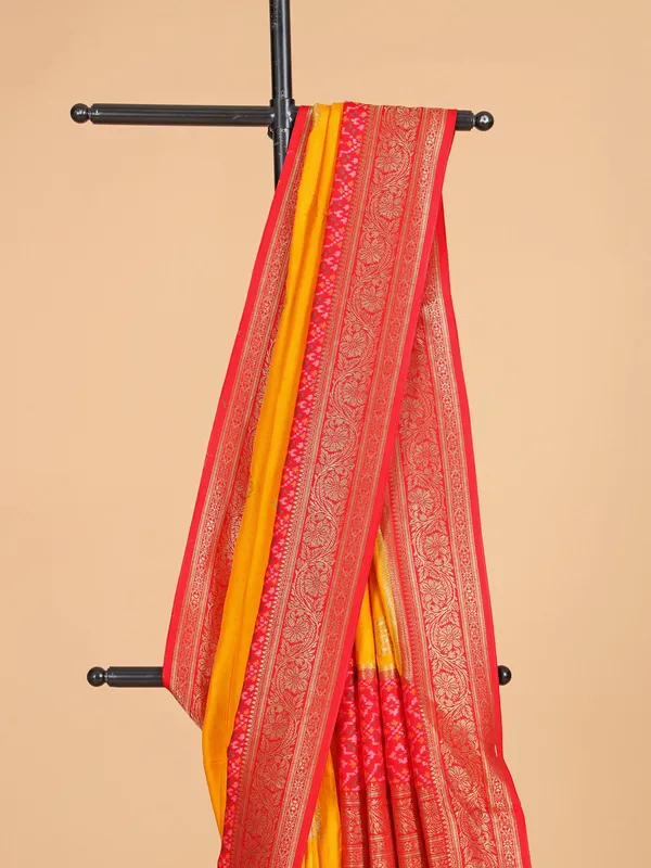 Yellow silk saree with bold red border