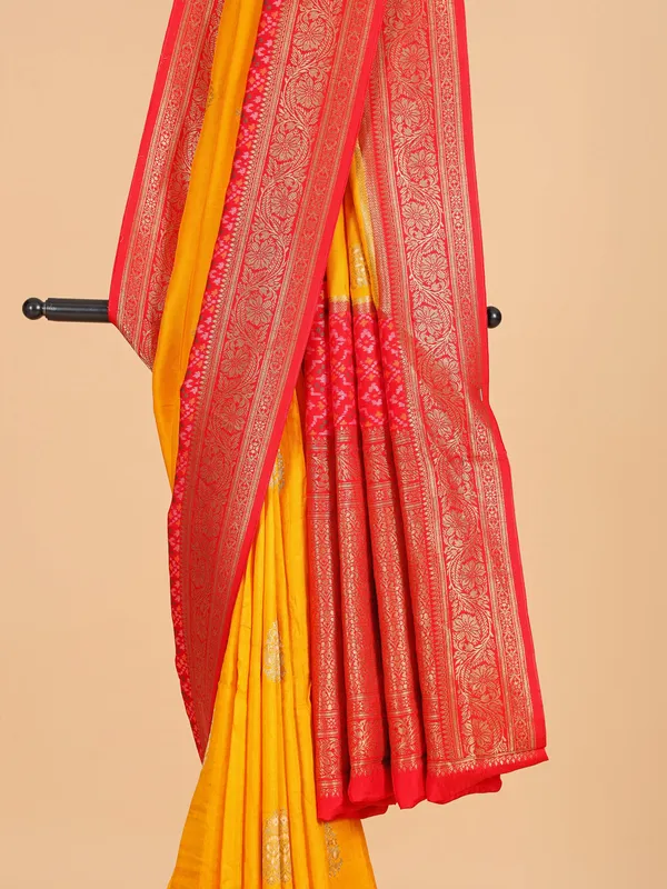 Yellow silk saree with bold red border