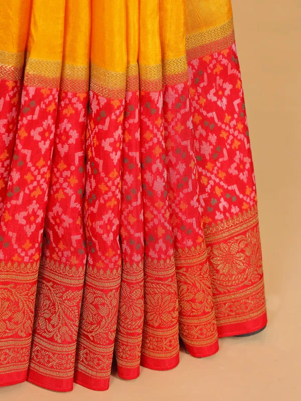 Yellow silk saree with bold red border