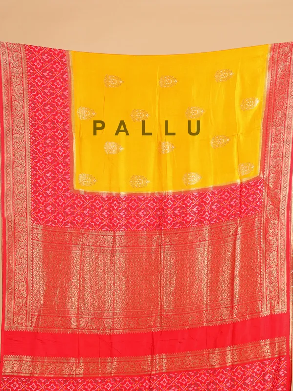 Yellow silk saree with bold red border