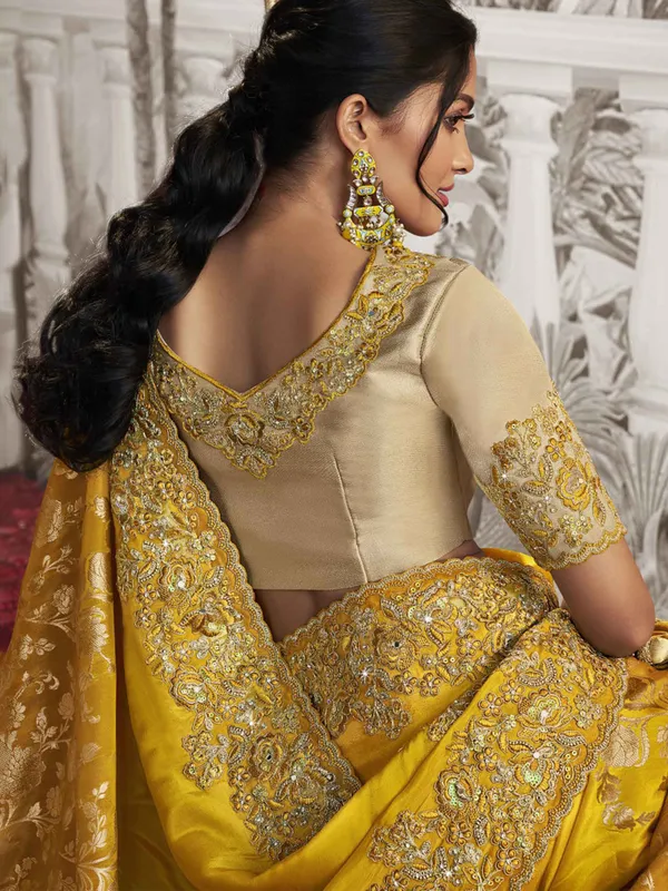 Yellow silk saree with embroidery work