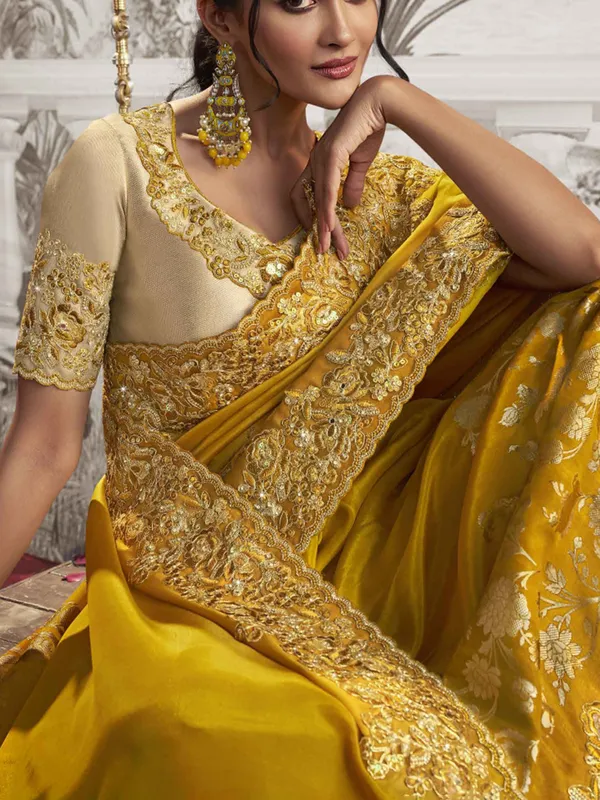 Yellow silk saree with embroidery work