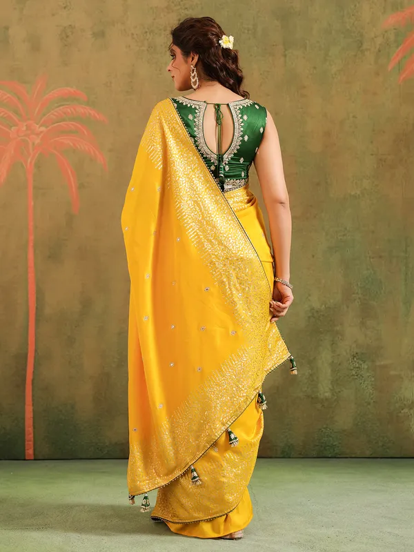 Yellow silk saree with green blouse