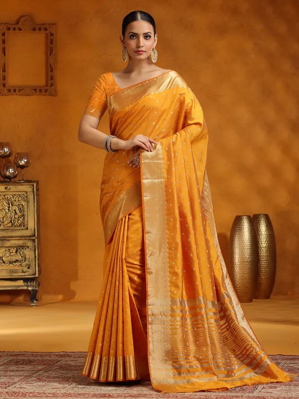 Yellow silk saree with stunning zari work