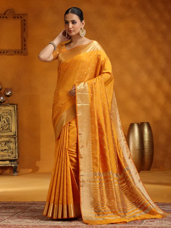 Yellow silk saree with stunning zari work