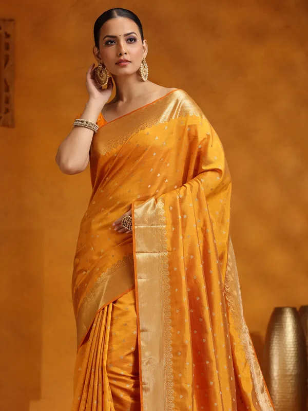 Yellow silk saree with stunning zari work