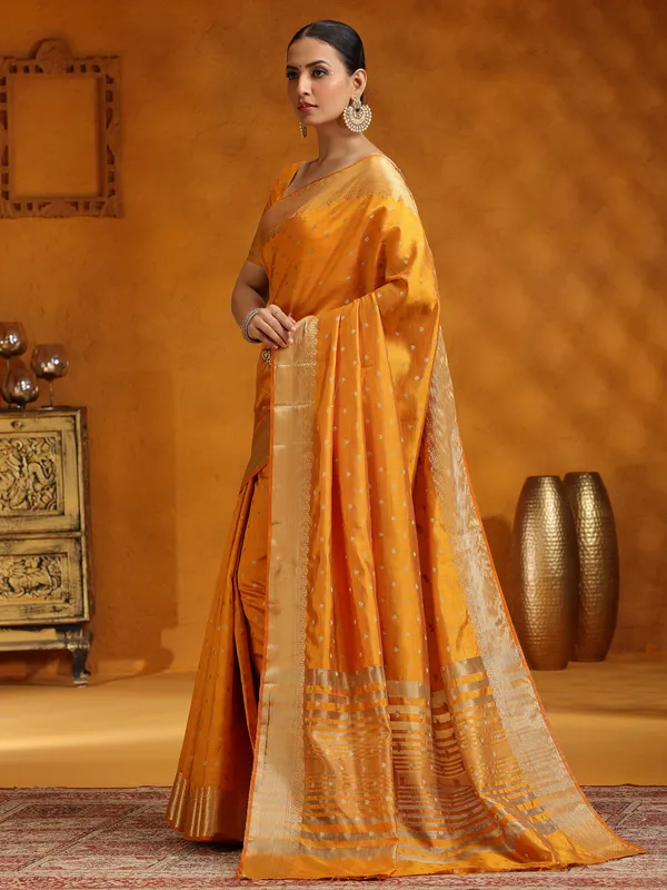 Yellow silk saree with stunning zari work