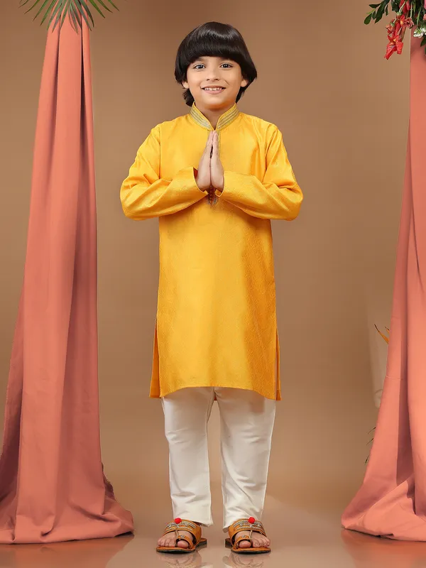 Yellow silk textured kurta suit