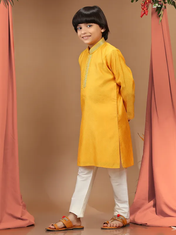 Yellow silk textured kurta suit