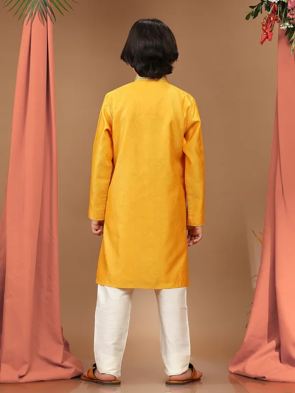 Yellow silk textured kurta suit