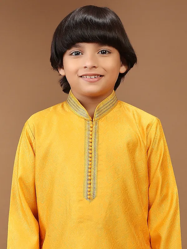Yellow silk textured kurta suit