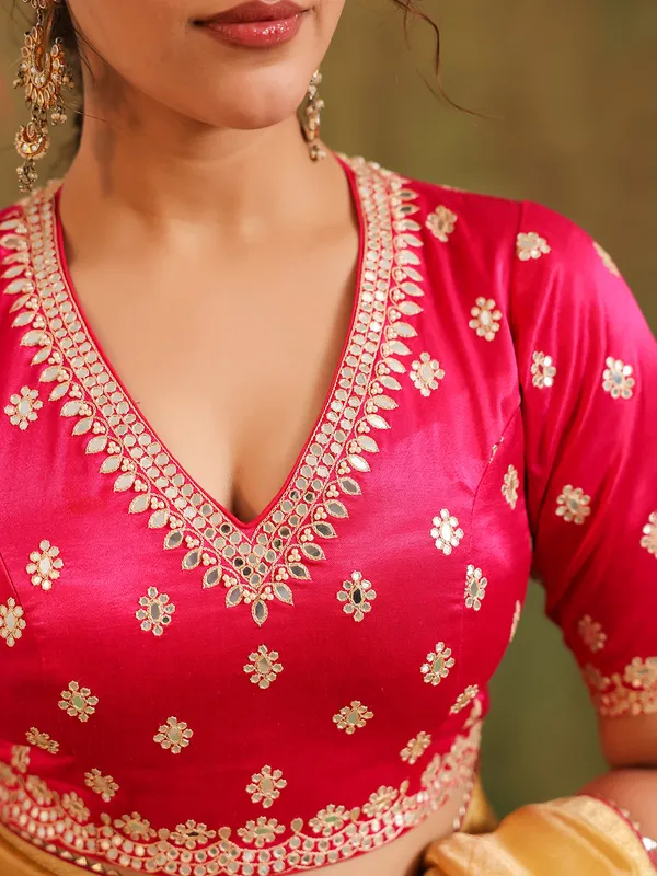 Yellow silk zari embellished saree with magenta blouse