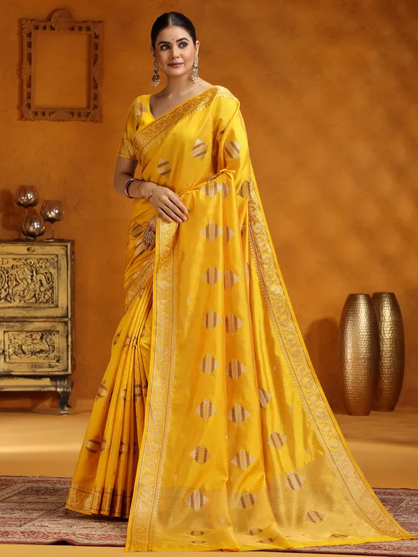 Yellow silk zari work saree