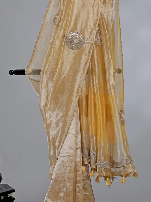 Yellow tissue silk saree with festive glow