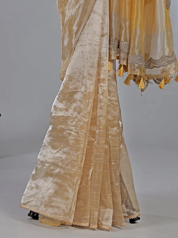 Yellow tissue silk saree with festive glow