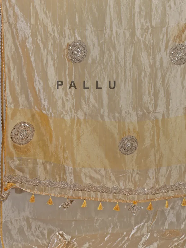 Yellow tissue silk saree with festive glow