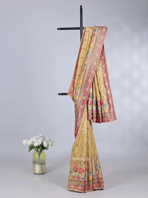 Yellow tissue silk saree with floral print and contrast border