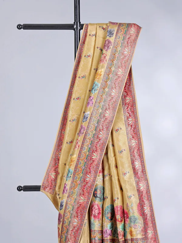 Yellow tissue silk saree with floral print and contrast border