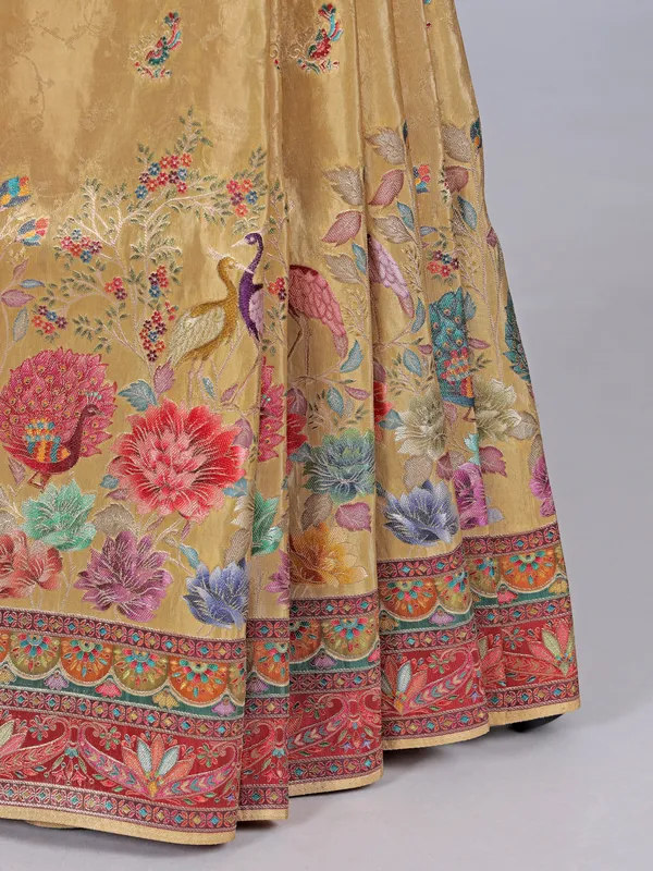 Yellow tissue silk saree with floral print and contrast border