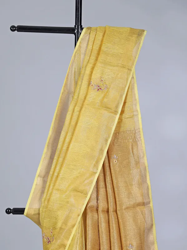 Yellow tissue silk saree with thread and sequins work