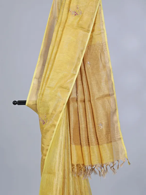 Yellow tissue silk saree with thread and sequins work