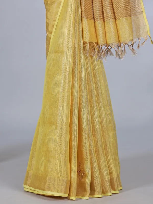 Yellow tissue silk saree with thread and sequins work