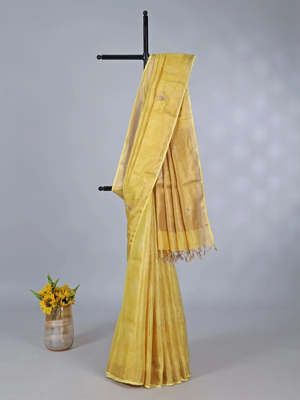 Yellow tissue silk saree with thread and sequins work
